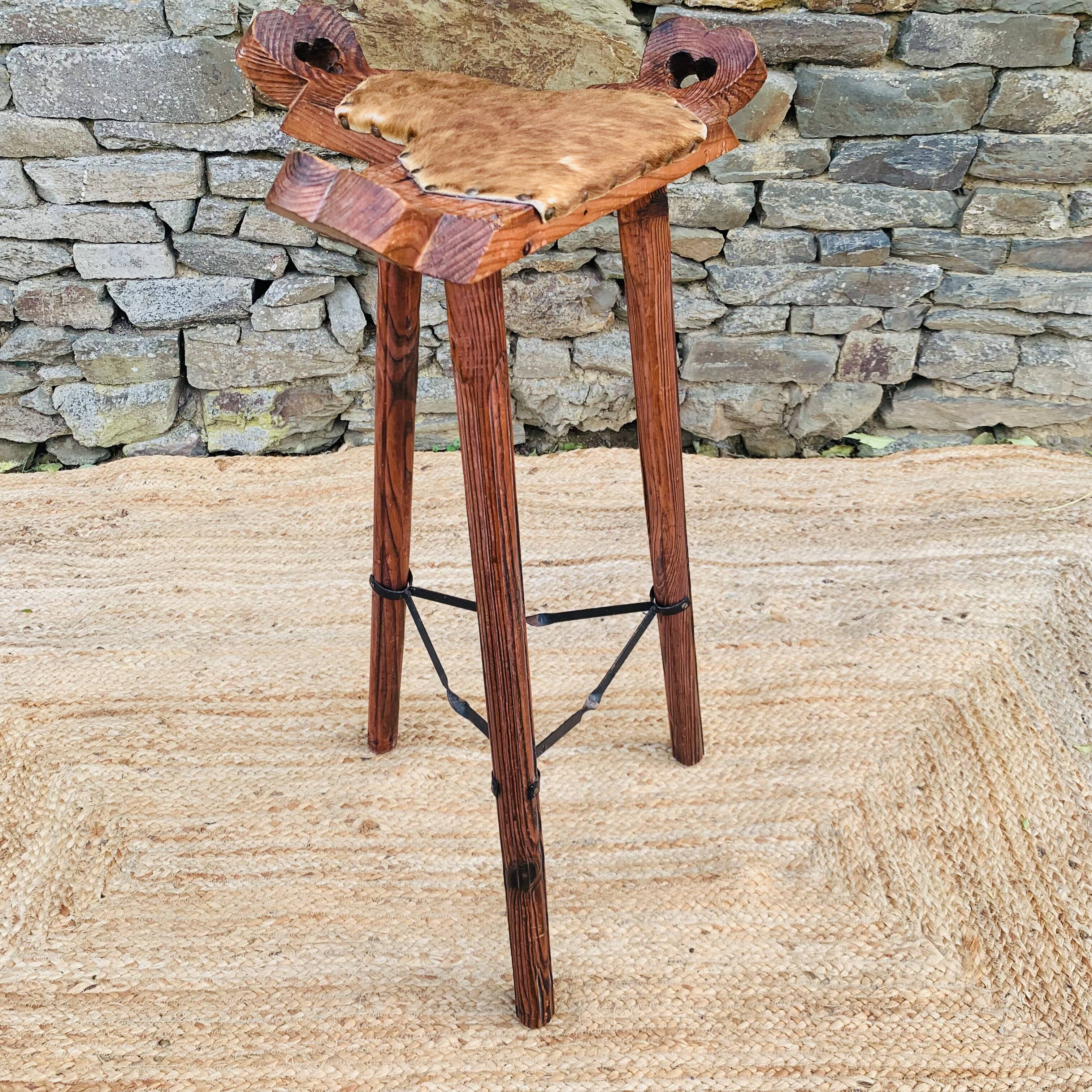 Set of 2 vintage high stools in cowhide and wood