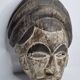 Masque Igbo en bois sculpté, grande coiffe, patine bicolore, Nigeria, 33 cm