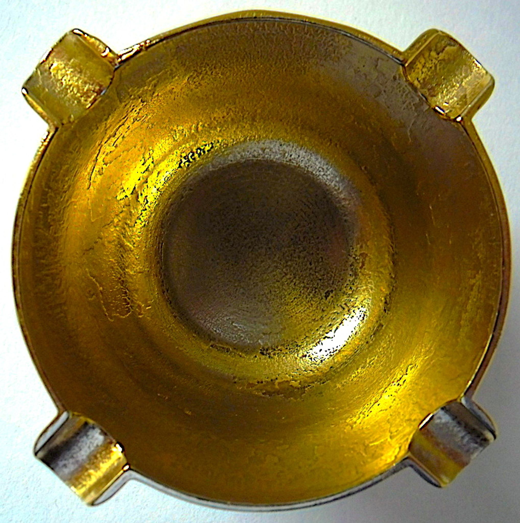 Three "vintage" bronze ashtrays with golden natural patina forming mortars with their drumsticks