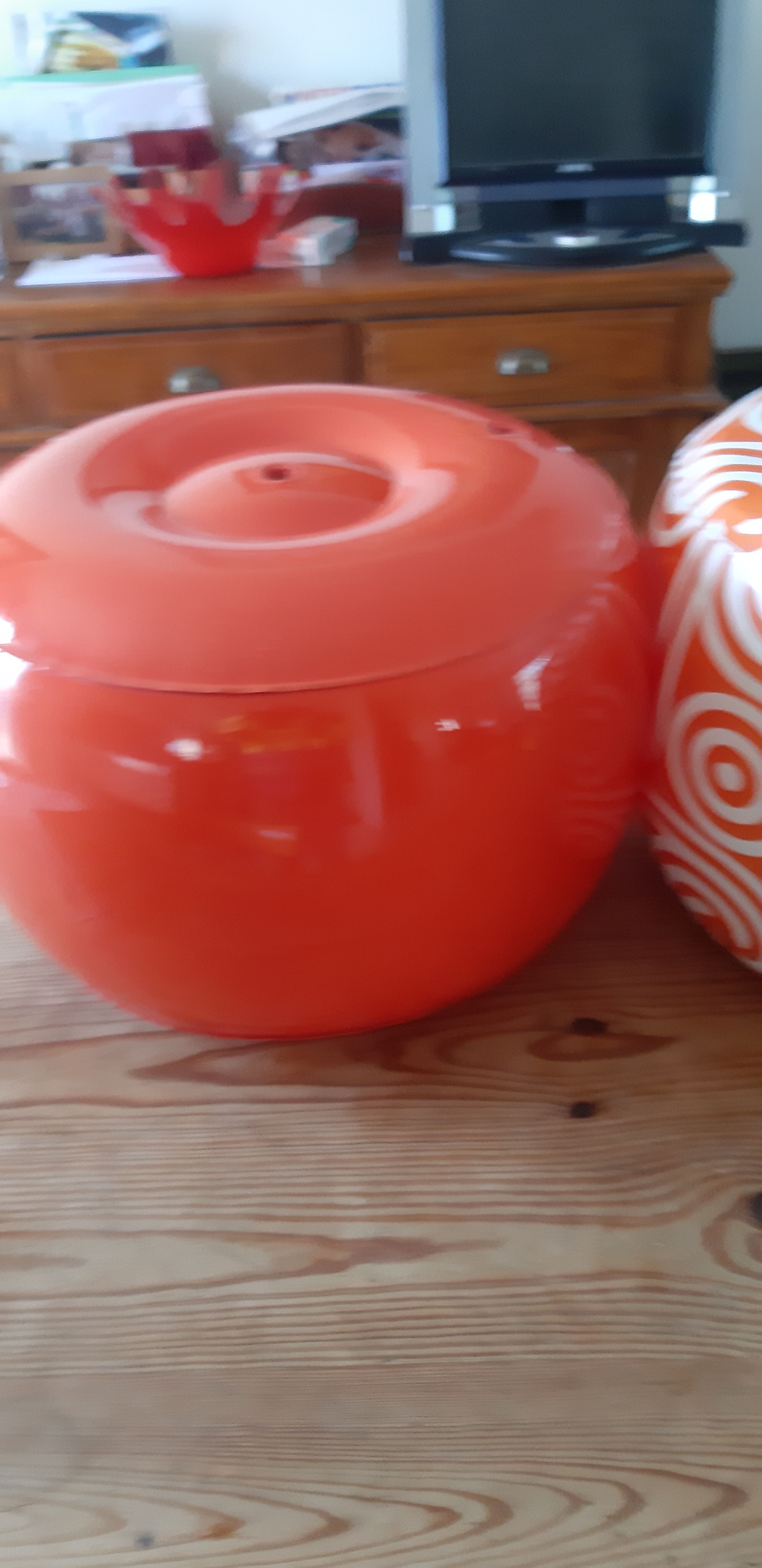 2 vintage inflatable poufs in orange plastic