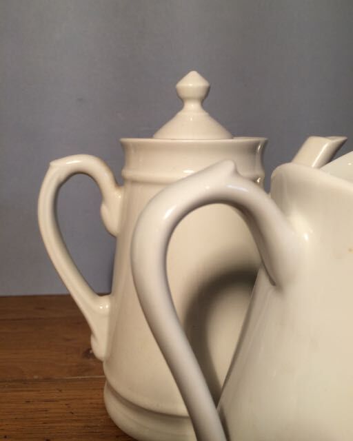 Trio of pitchers and jam jar