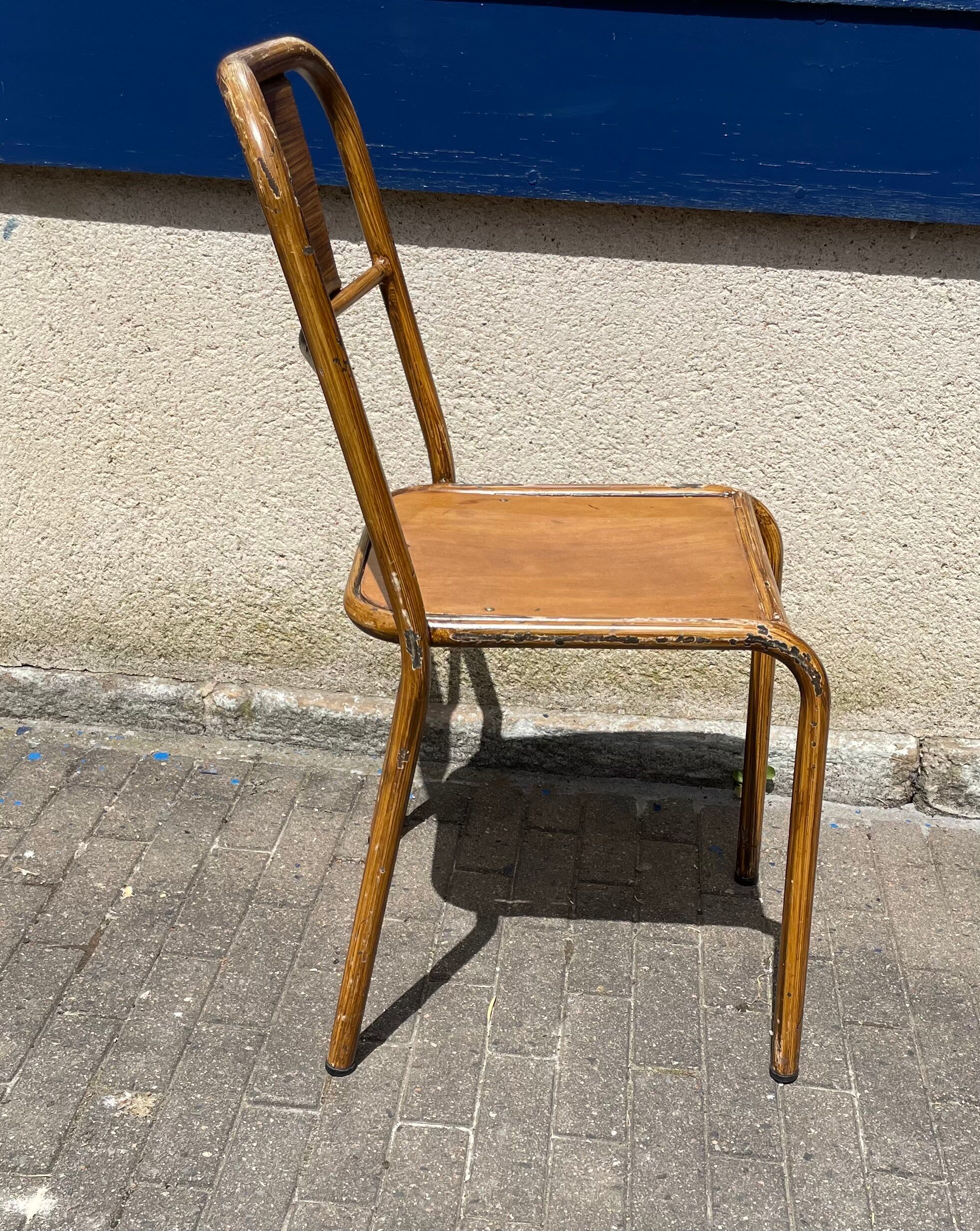 Set of sixteen industrial metal chairs from the 1960s