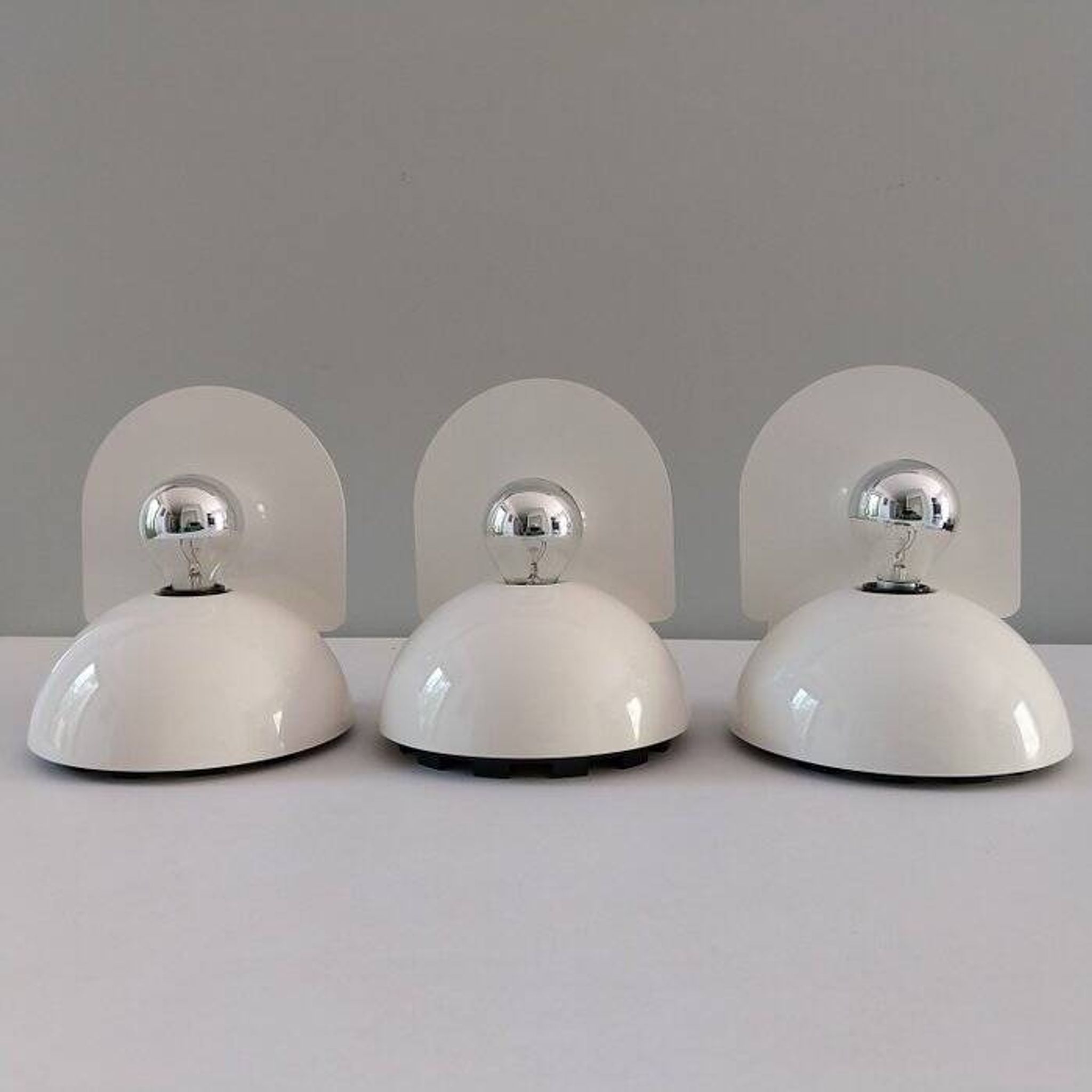 Set of 3 Artemide “Buco” lamps by Claudio Bini