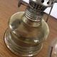 Oil lamp with glass pedestal and integrated round mirror