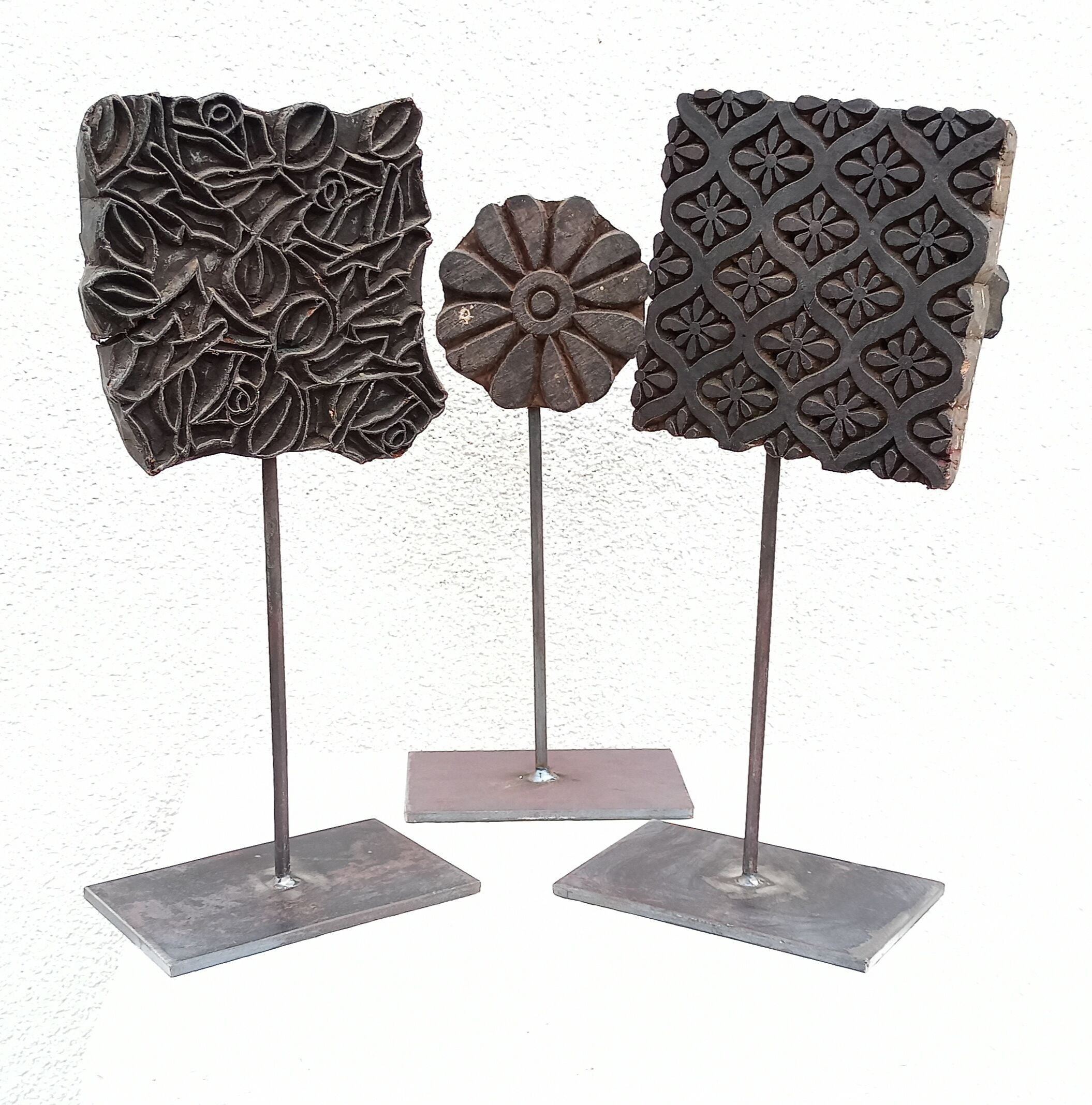 Set of three old ink pads on a base