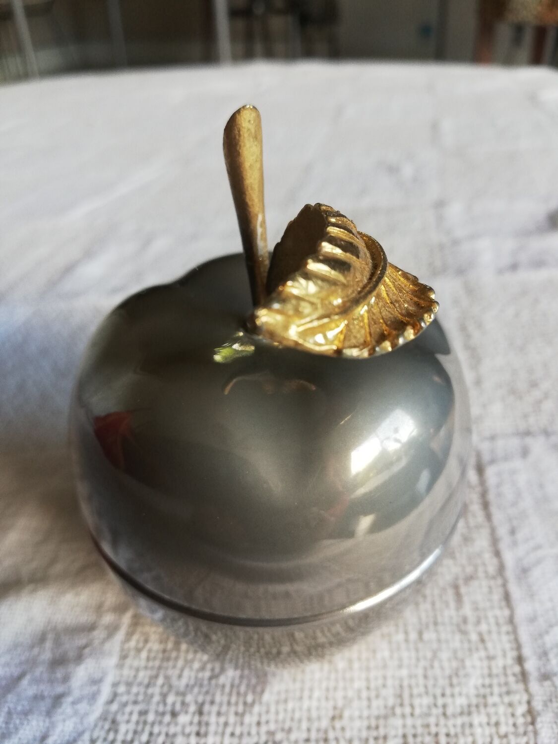 Silver apple box and gold leaf