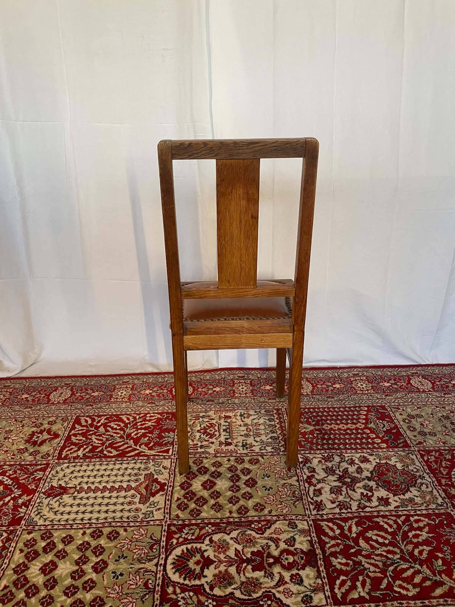 Set of 4 Art Deco chairs in oak and brown leather.