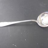 Silver metal soup ladle