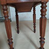 Pair of Louis Philippe style walnut bedside tables / work tables with flap