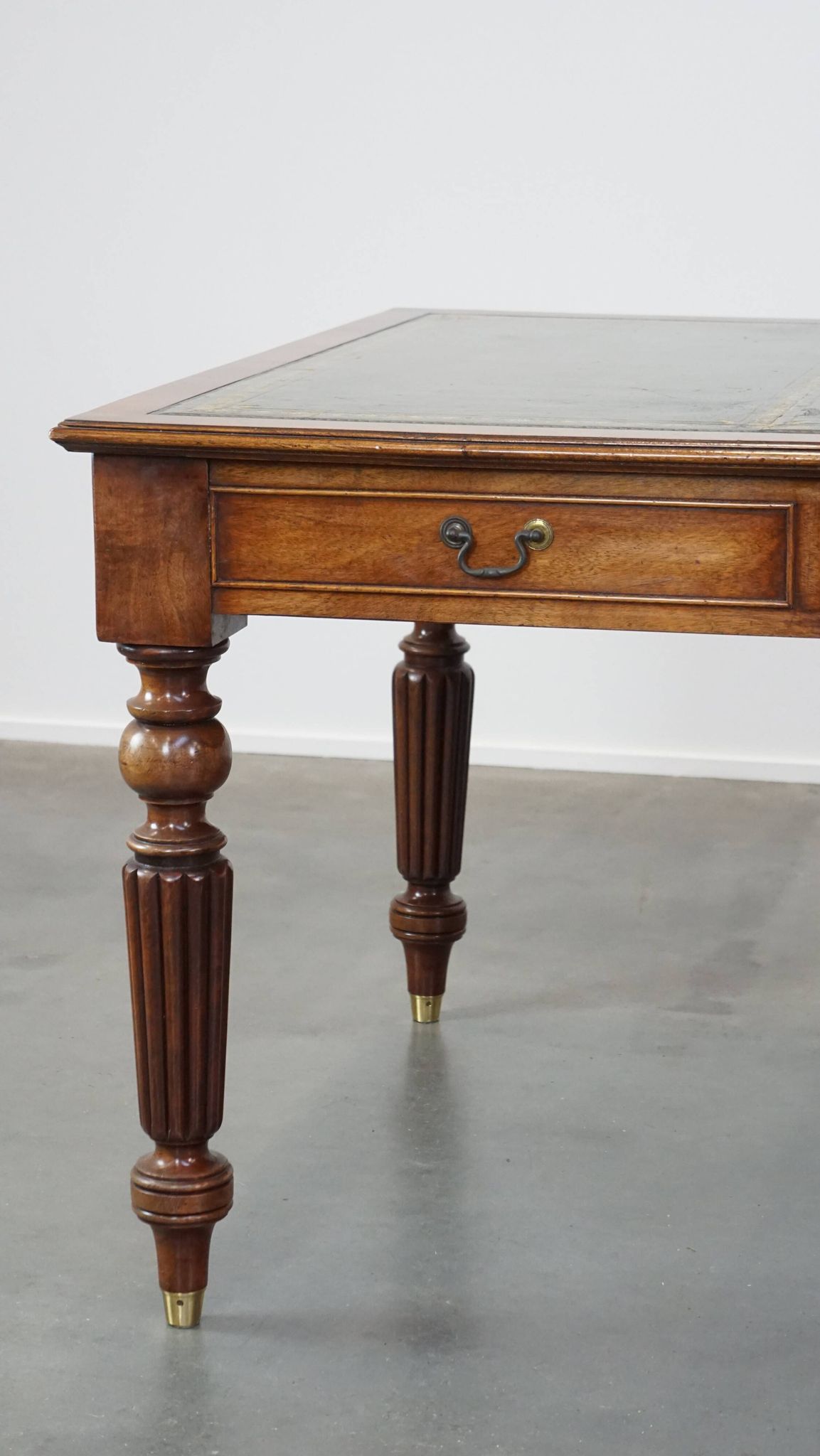 Large writing desk with green leather top, elegant legs and 3 English style drawers