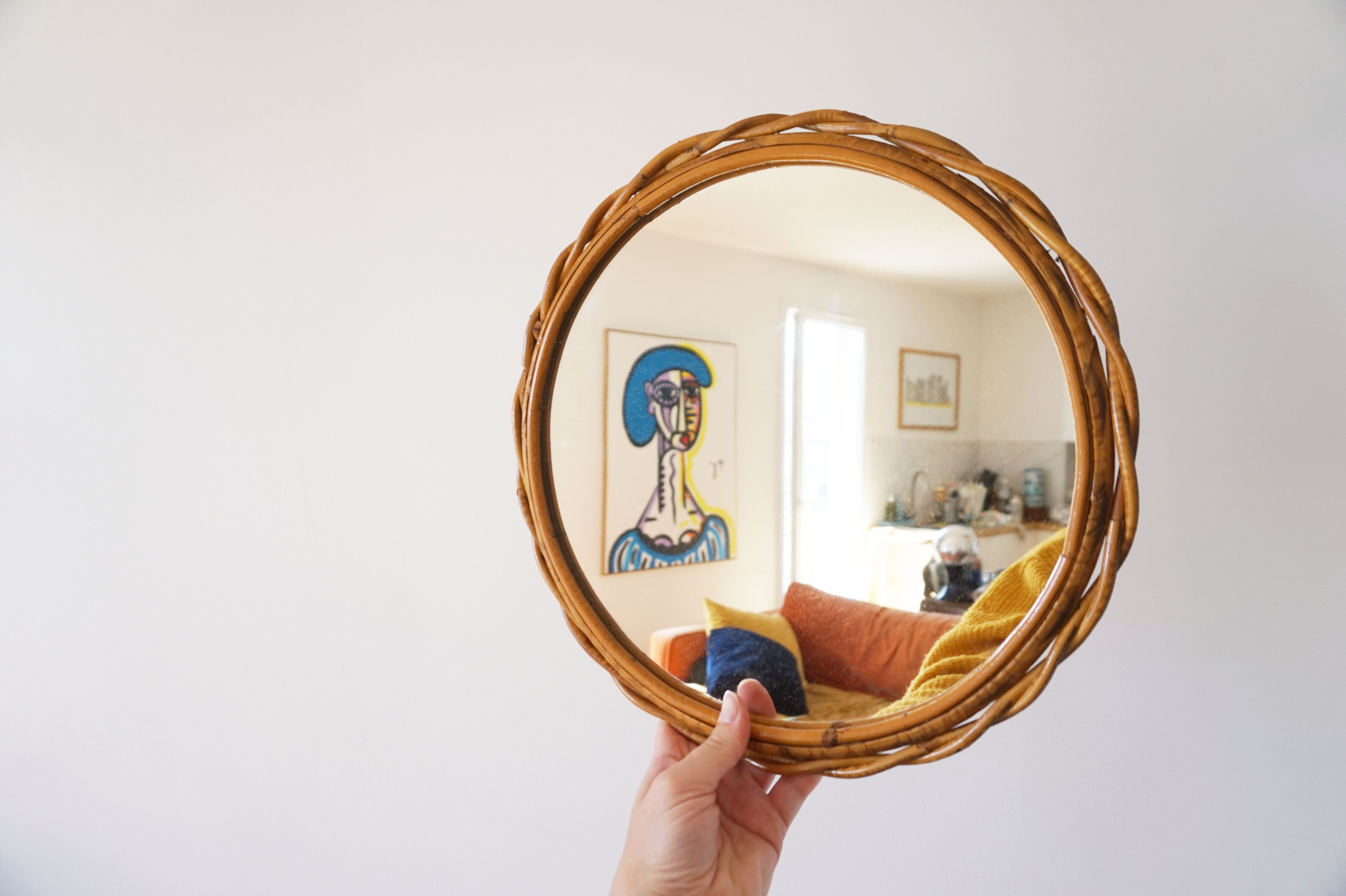 Vintage rattan sun mirror