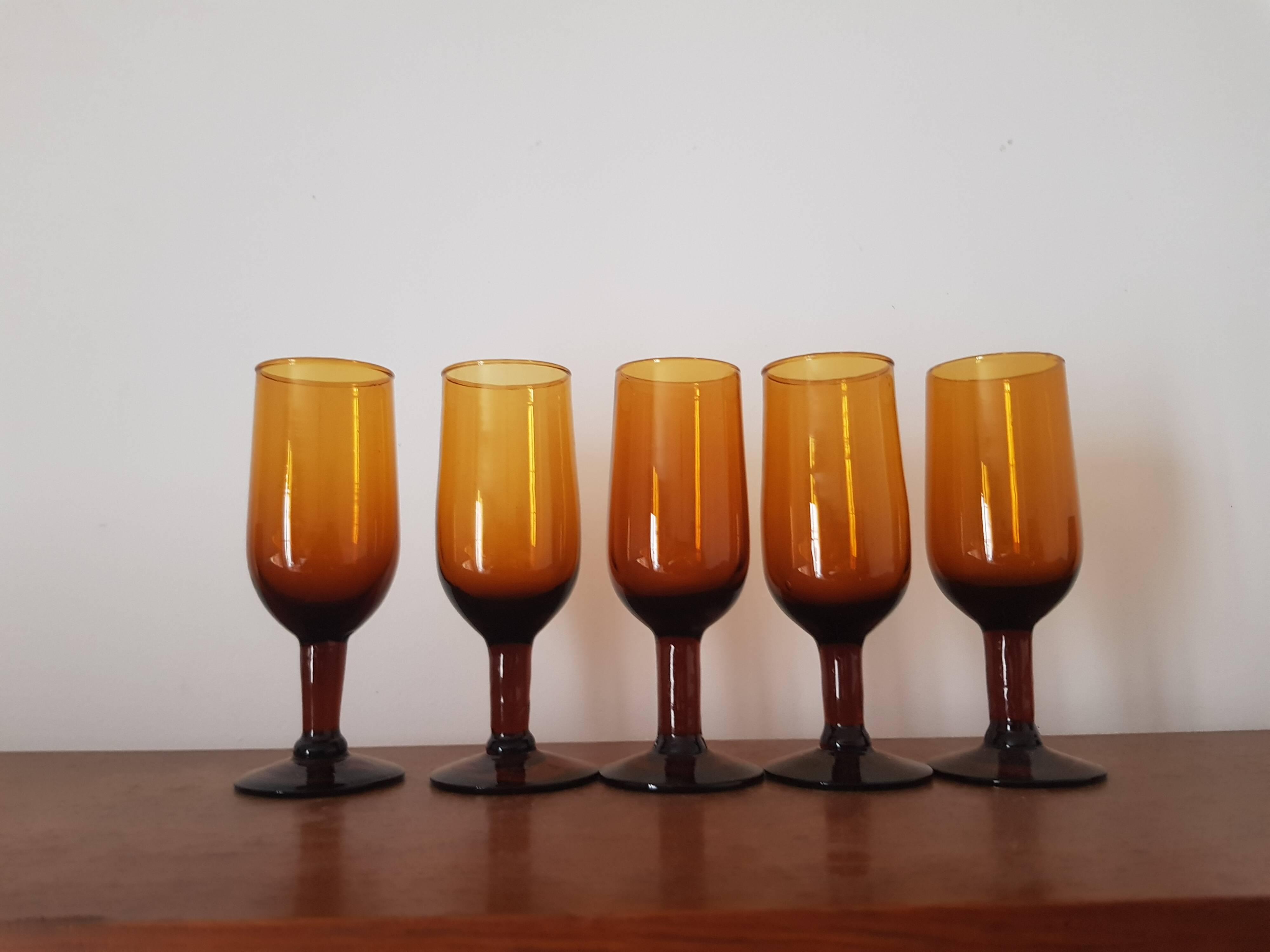 Set of 5 amber stemmed glasses