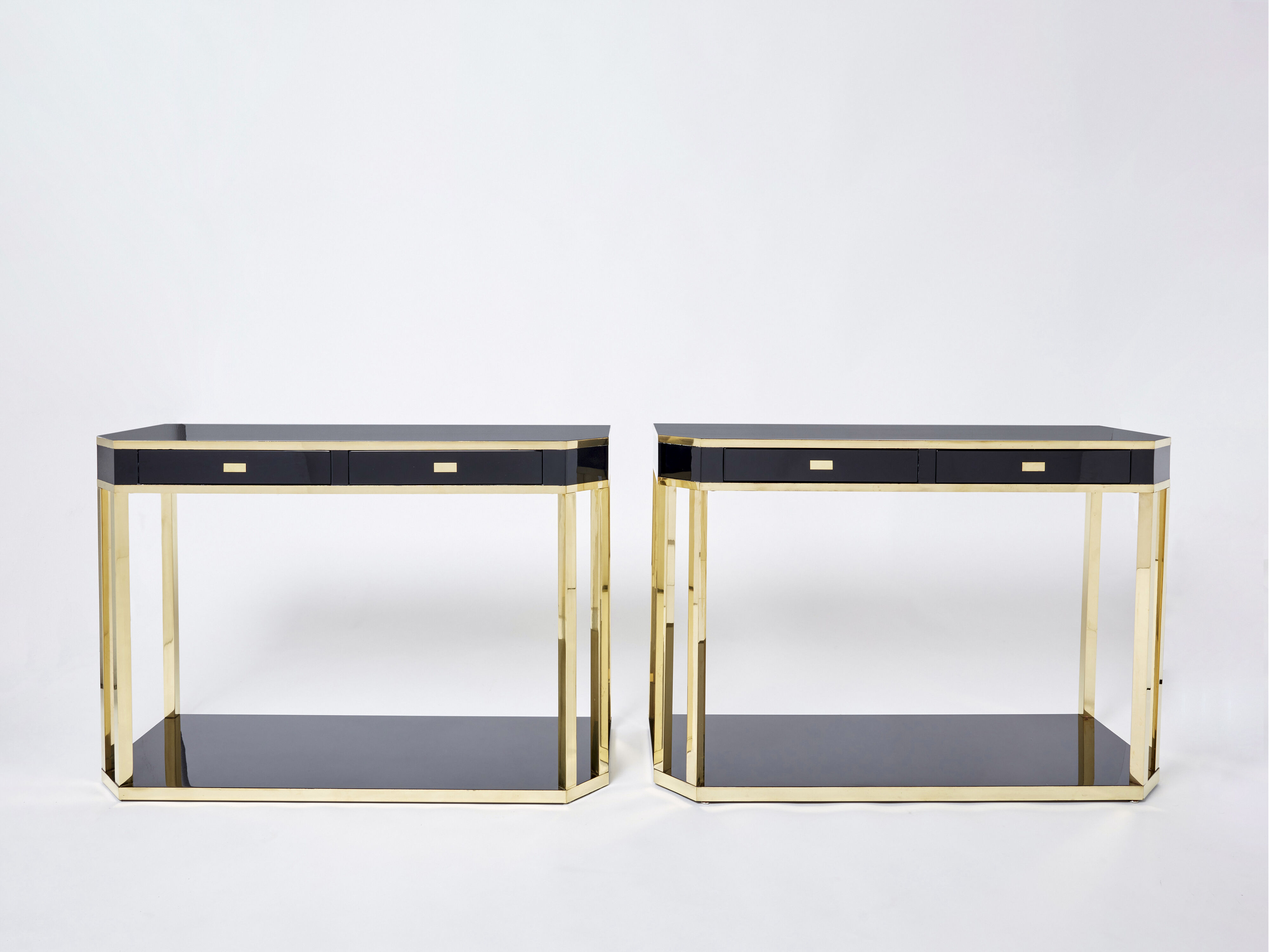 Pair of black lacquered consoles and brass 1970