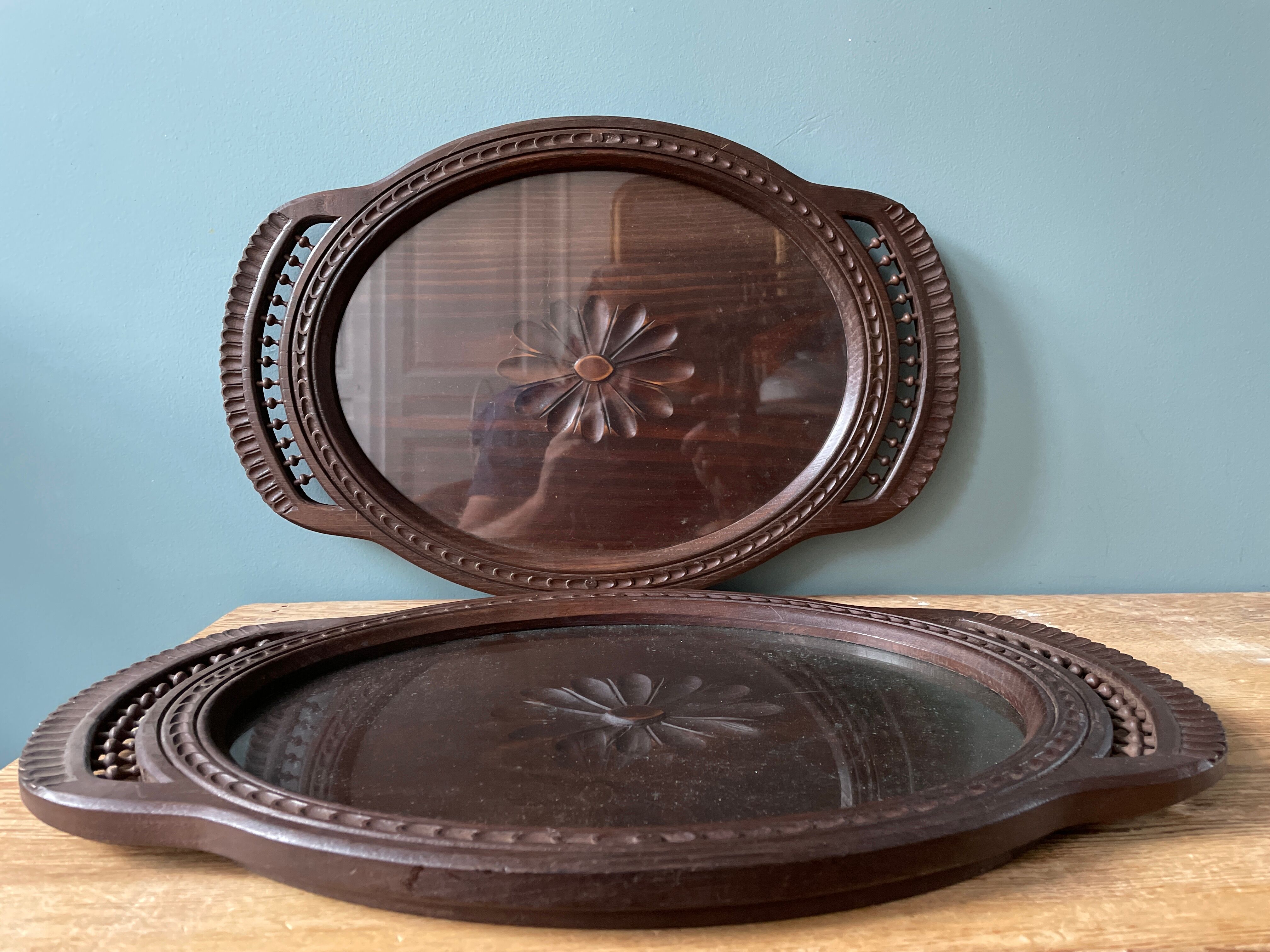 Set of two vintage carved oak service trays
