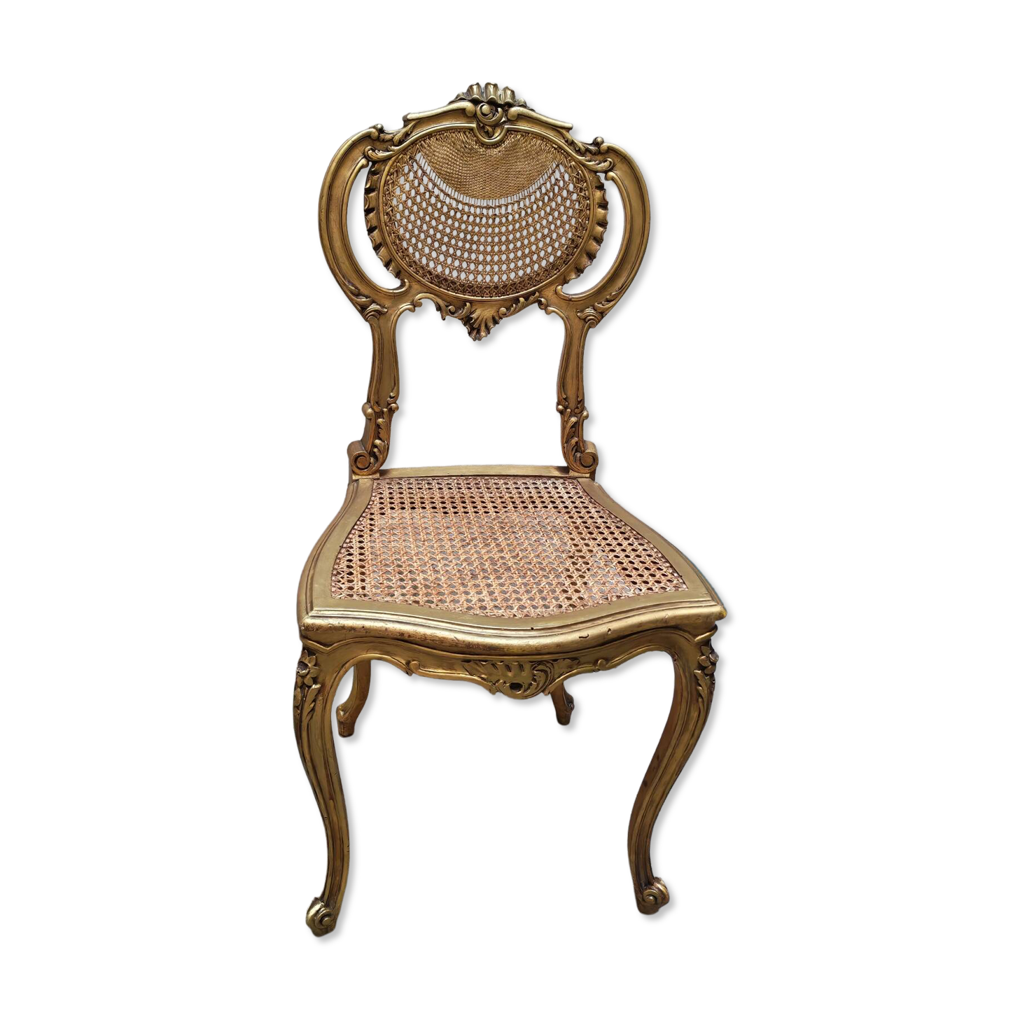 Antique rococo chair in gilded wood and caning