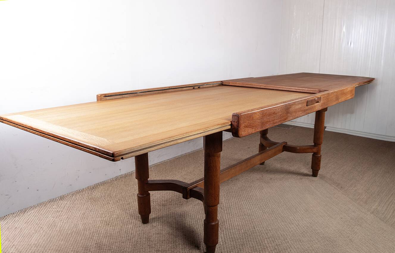 Large extendable dining table, 320 cm, in oak, Guillerme and Chambron.