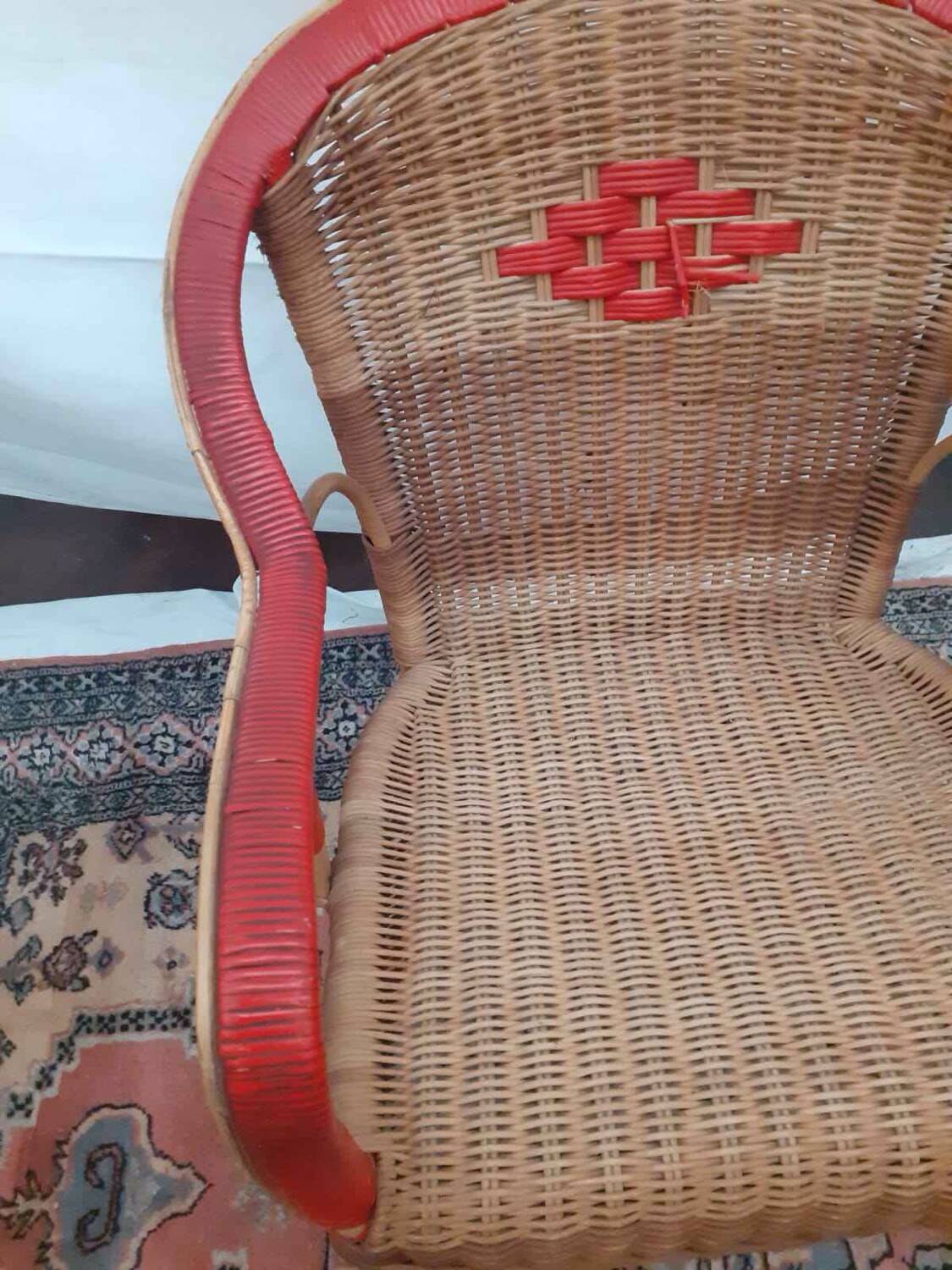 Refurbished wicker armchair