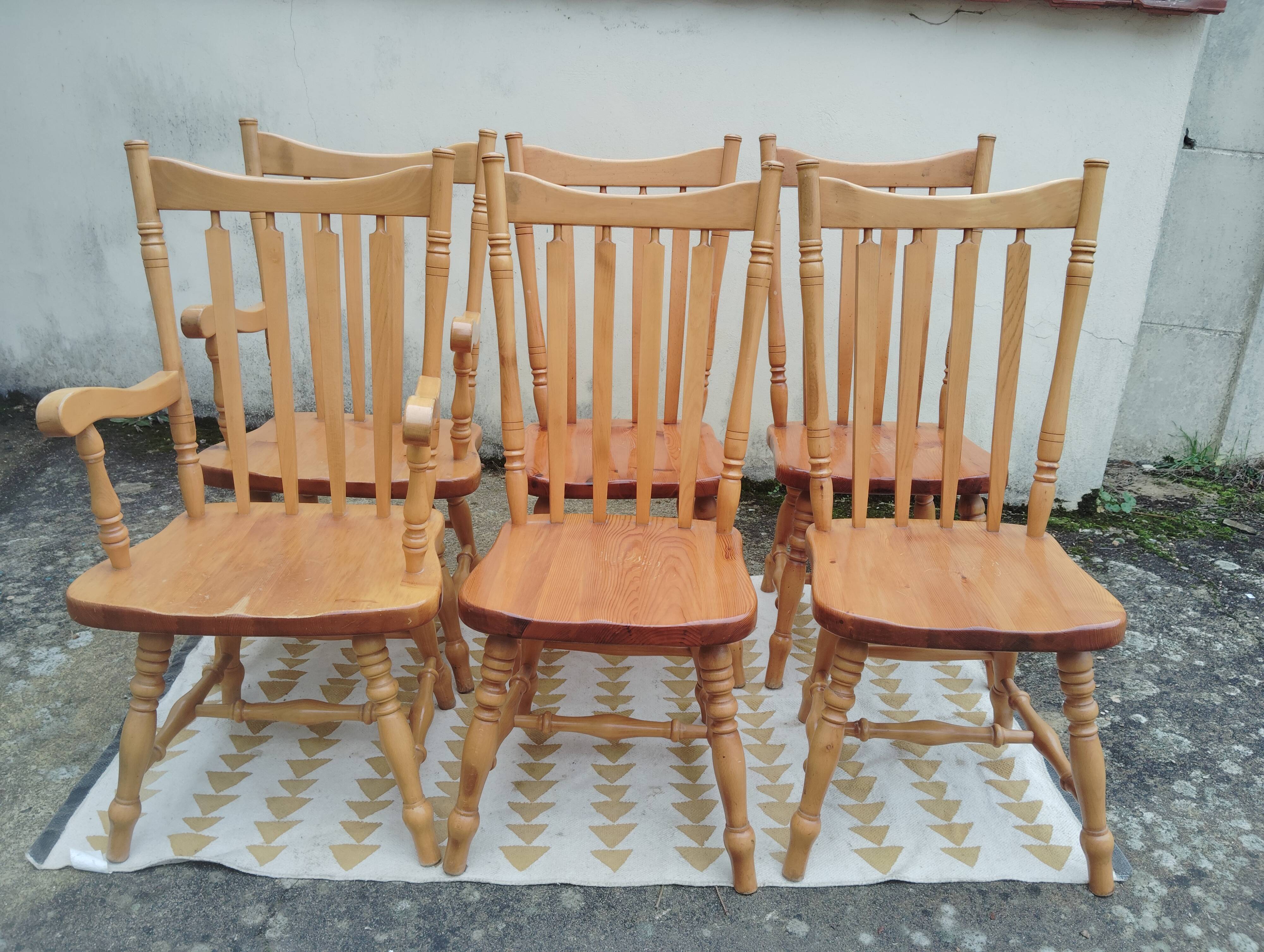 Set of 6 western bistro chairs, including 2 with armrests.