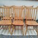 Set of 6 western bistro chairs, including 2 with armrests.