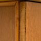 Rattan wardrobe with tapered legs from the 1960s.