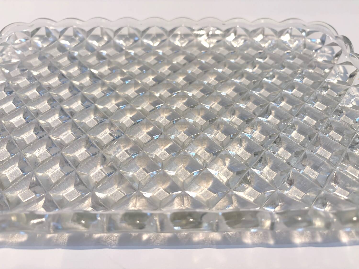 Pressed glass service plate with diamond points, 1950s