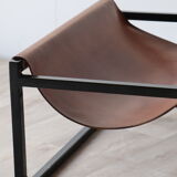 Pair of vintage armchairs in stretched leather and metal structure