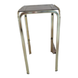 Golden side table and smoked glass