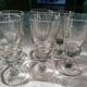 Absinthe service glasses and spoons.