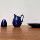 Swedish Salier Mid-Century Bla Eld, Salt Shaker, Milk Jug, Saucer and Plate by Hertha Bengtson for Rörstrand, 1960s, Set of 4