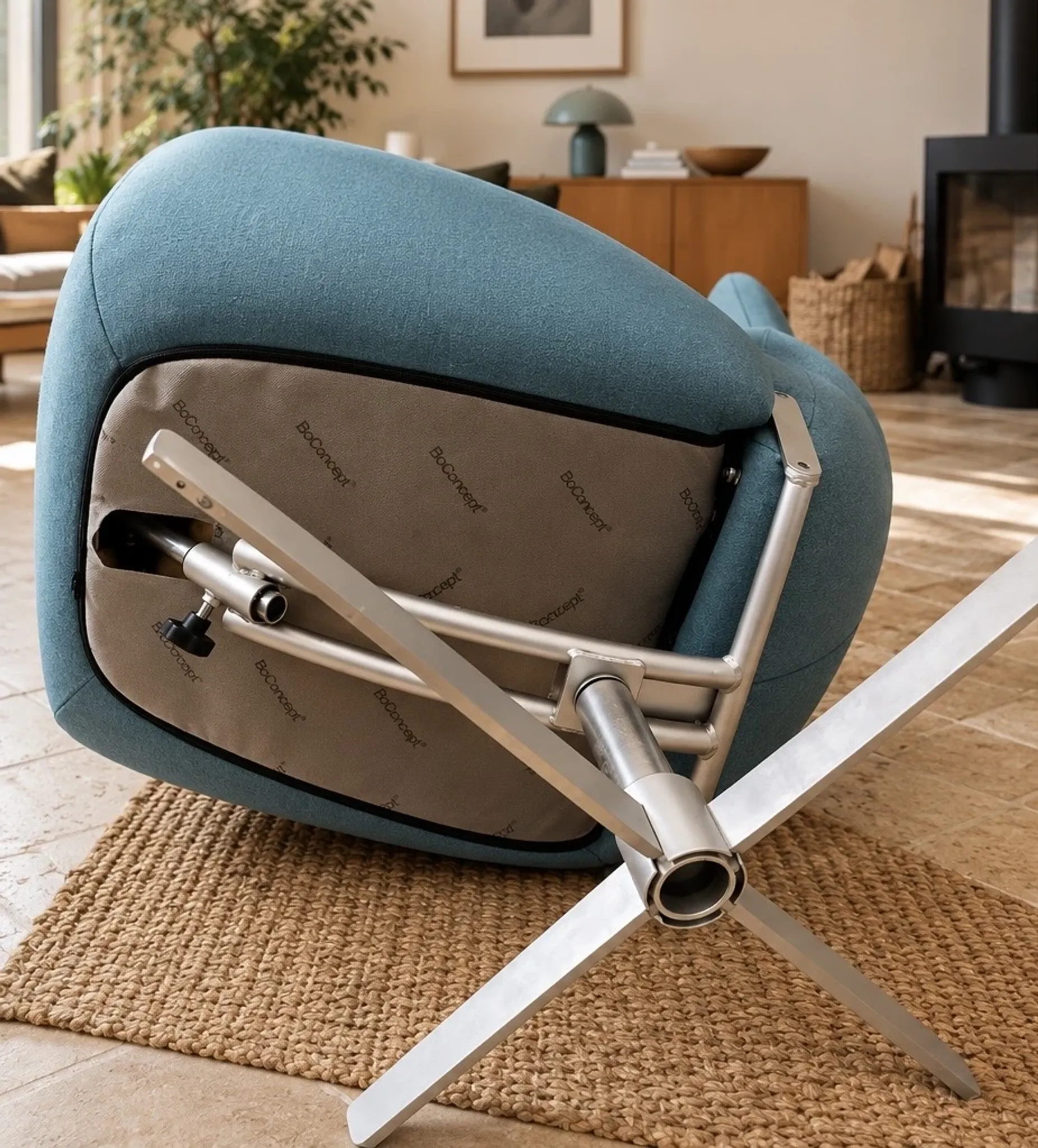 BoConcept design armchair in petrol blue, swivel and reclining.