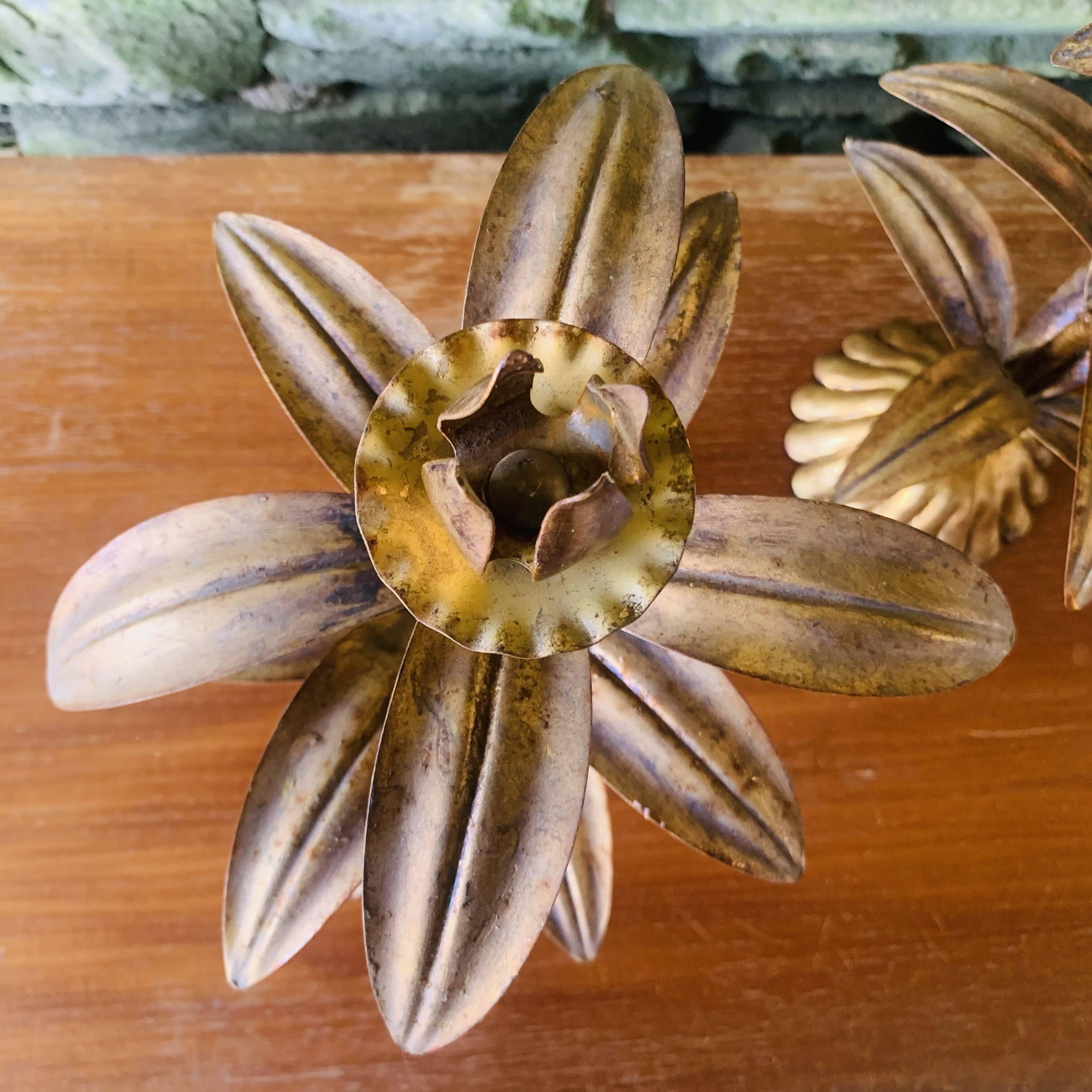Pair of candlesticks with golden leaves from the 1960s.