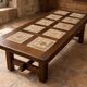 Vintage 60s coffee table with tile decoration of birds and flowers.