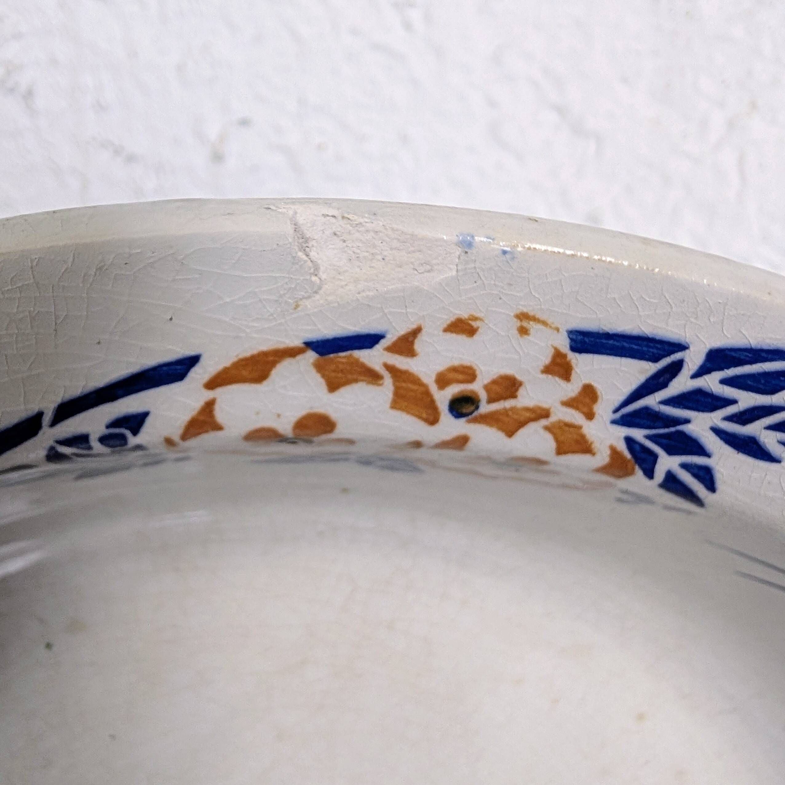 Shallow dish Hamage & Moulin des Loups, blue and orange floral stencil decoration.