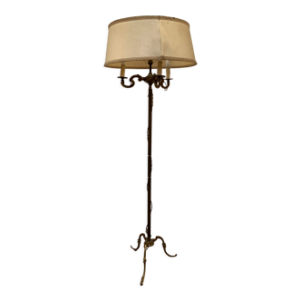 Floor lamp has three brass light arms