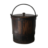 Old grain bucket in oak wrought iron strapping