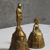 Two vintage bronze table cloches, finely chiseled and gilded