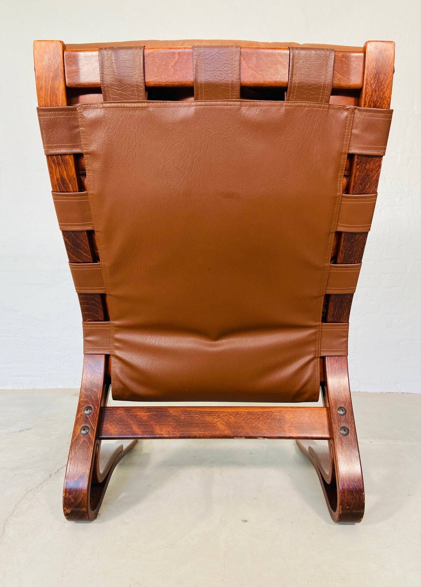 Vintage scandinavian cognac lounge chair by oddvin rykken 1960s