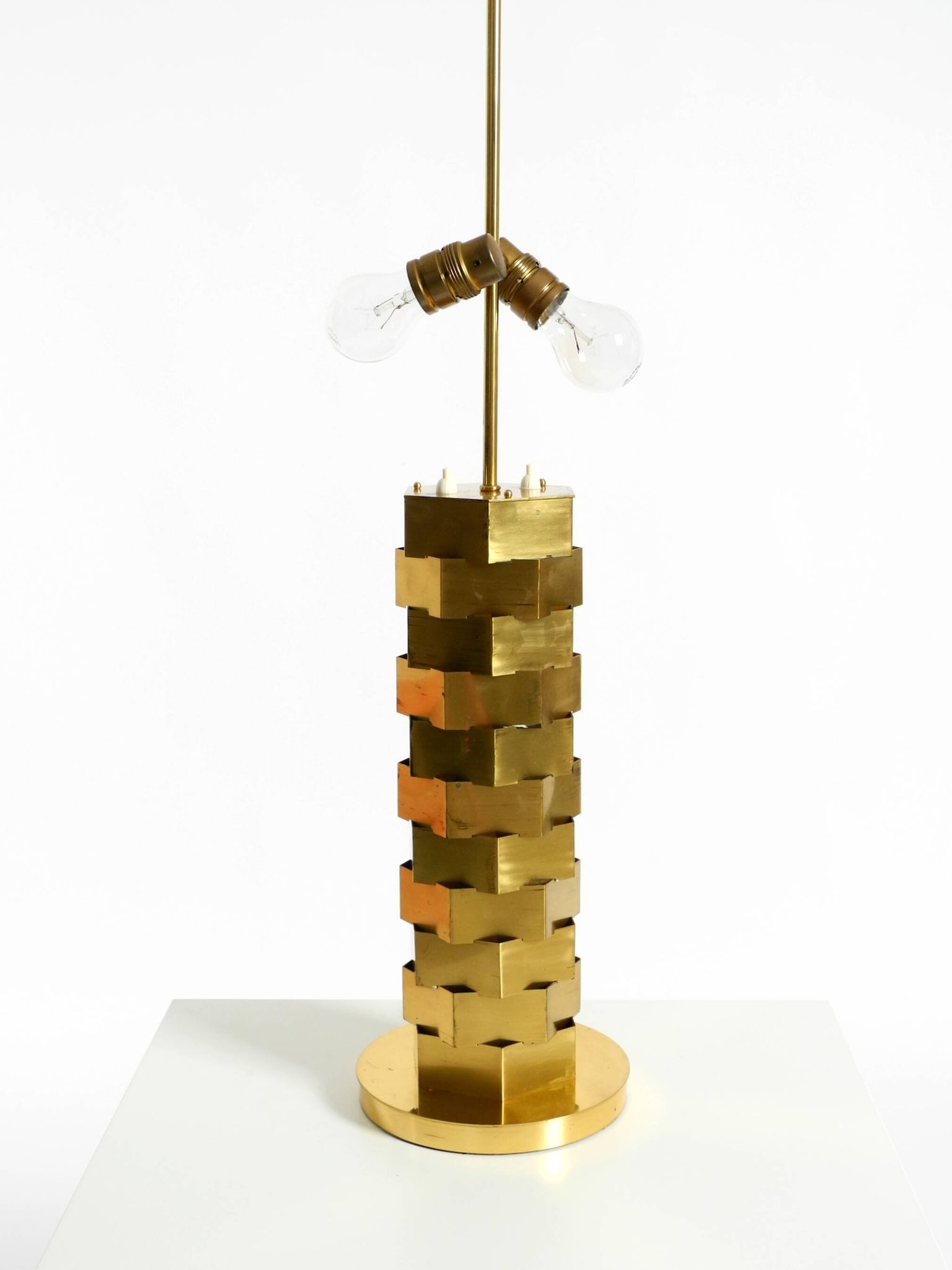1960s brass table lamp by Vereinigte Werkstätten with an illuminated base