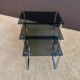Set of 3 nesting tables in metal and smoked glass.