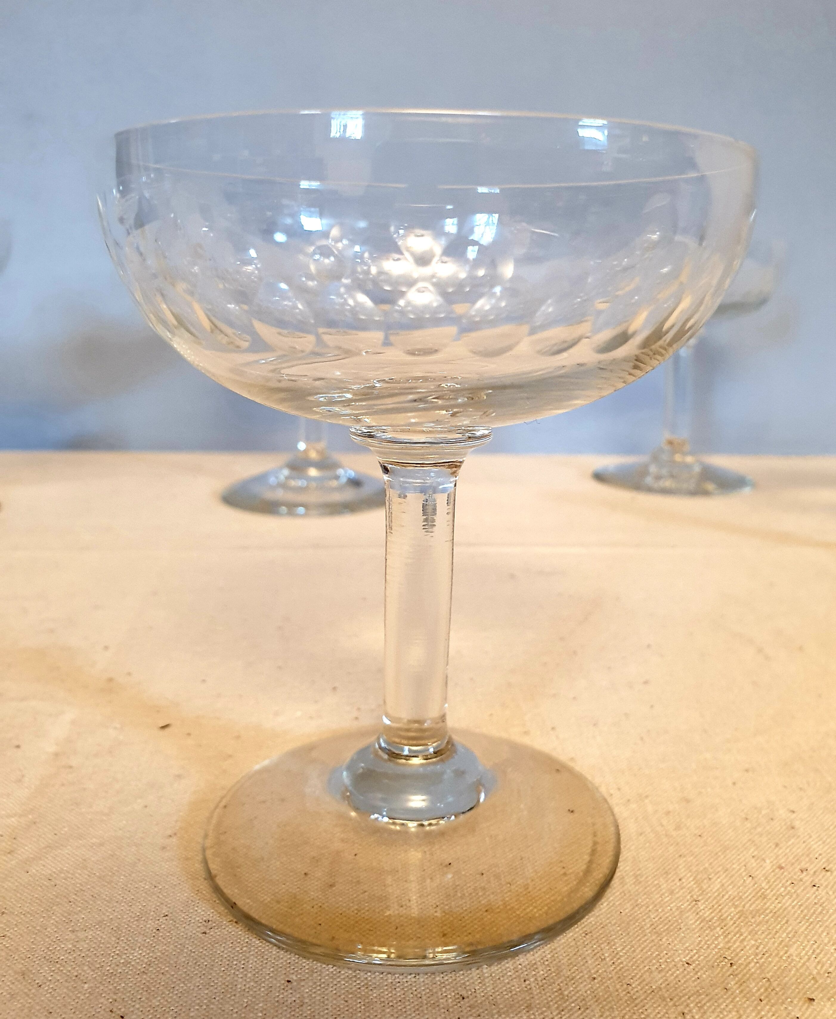 Assorted 7 engraved crystal Champagne cups.