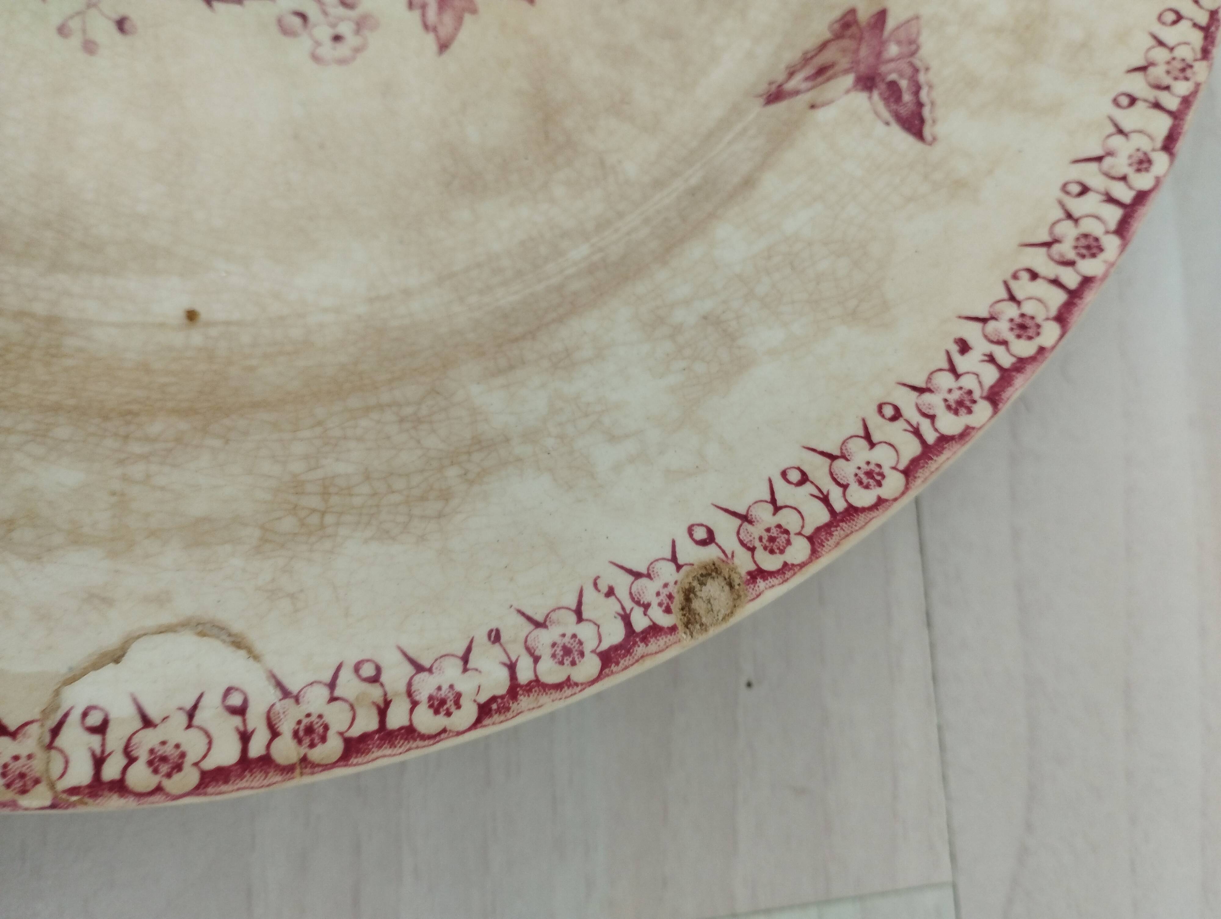 Round plate in iron earth of Gien model Pink Hawthorn