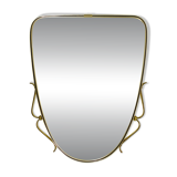 Elegant wall mirror in brass and black from the mid-century, Italy, 1950s.