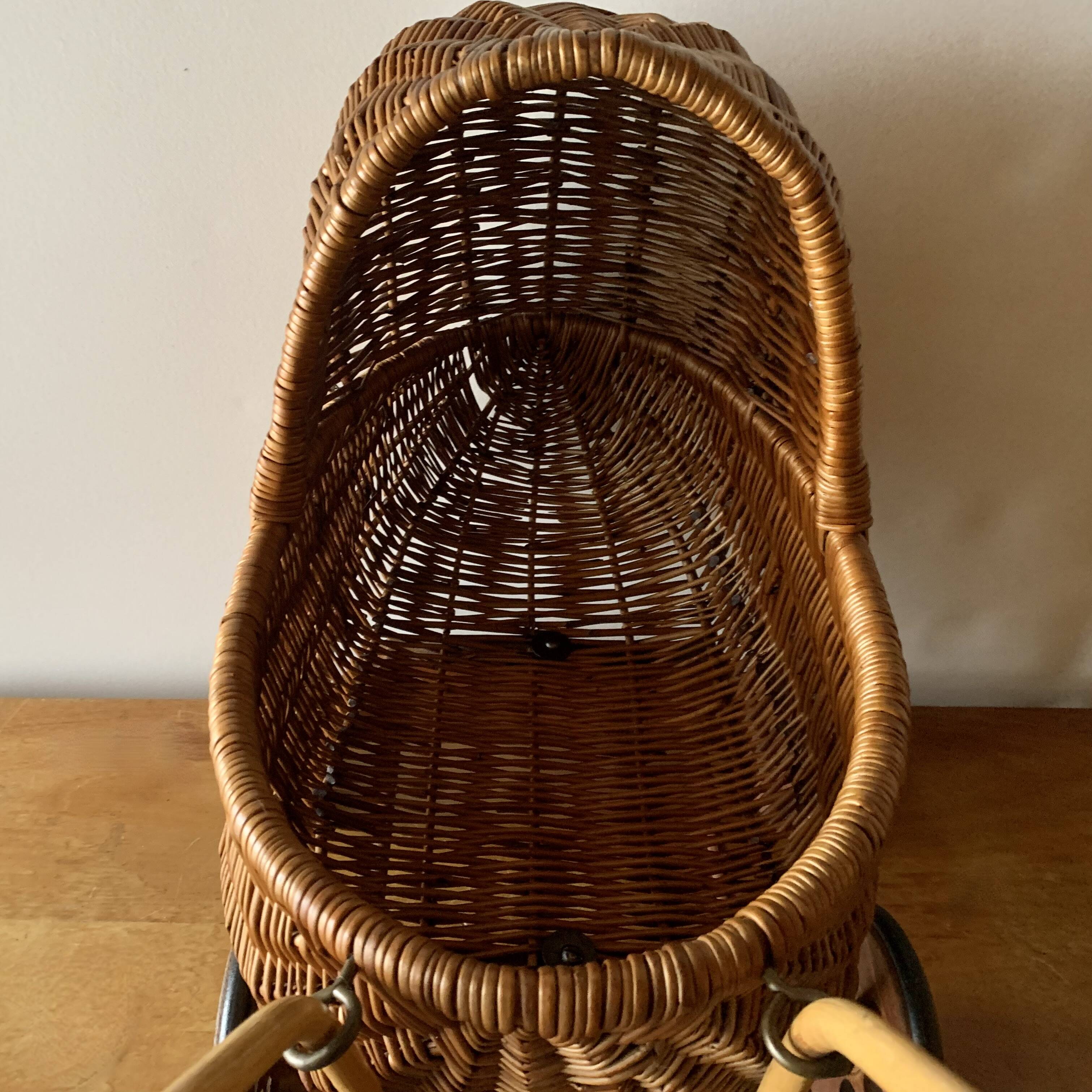 Old wicker dolls' pram - wooden wheels