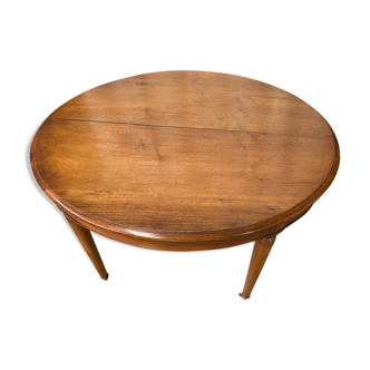 Table swallows it in blond walnut