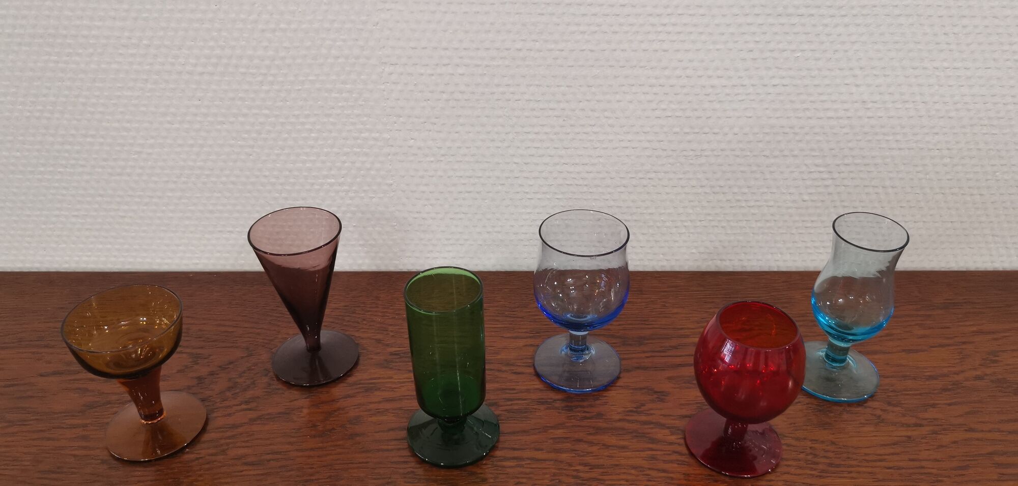 Set of 6 old liquor glasses on mismatched feet