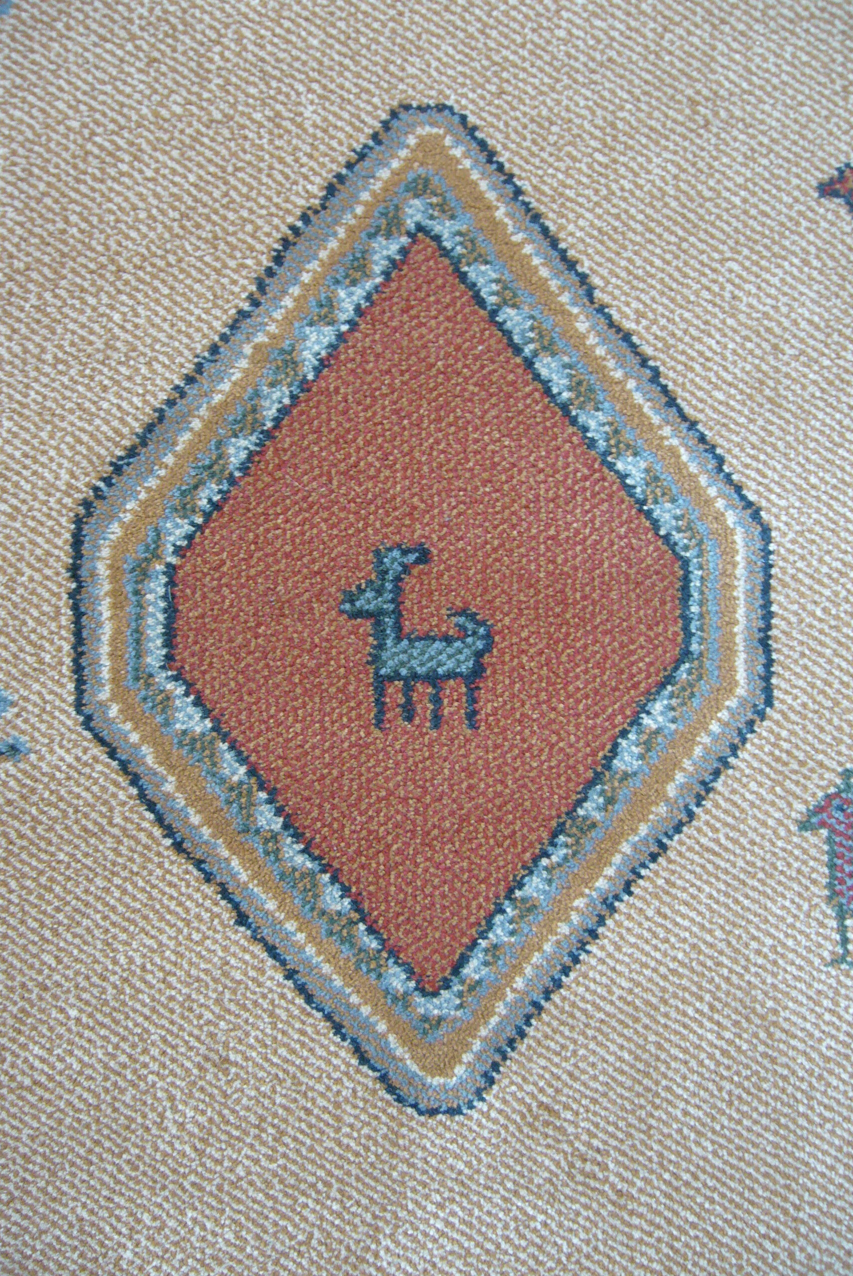 Pair of 60 x 120 Peruvian wool rugs