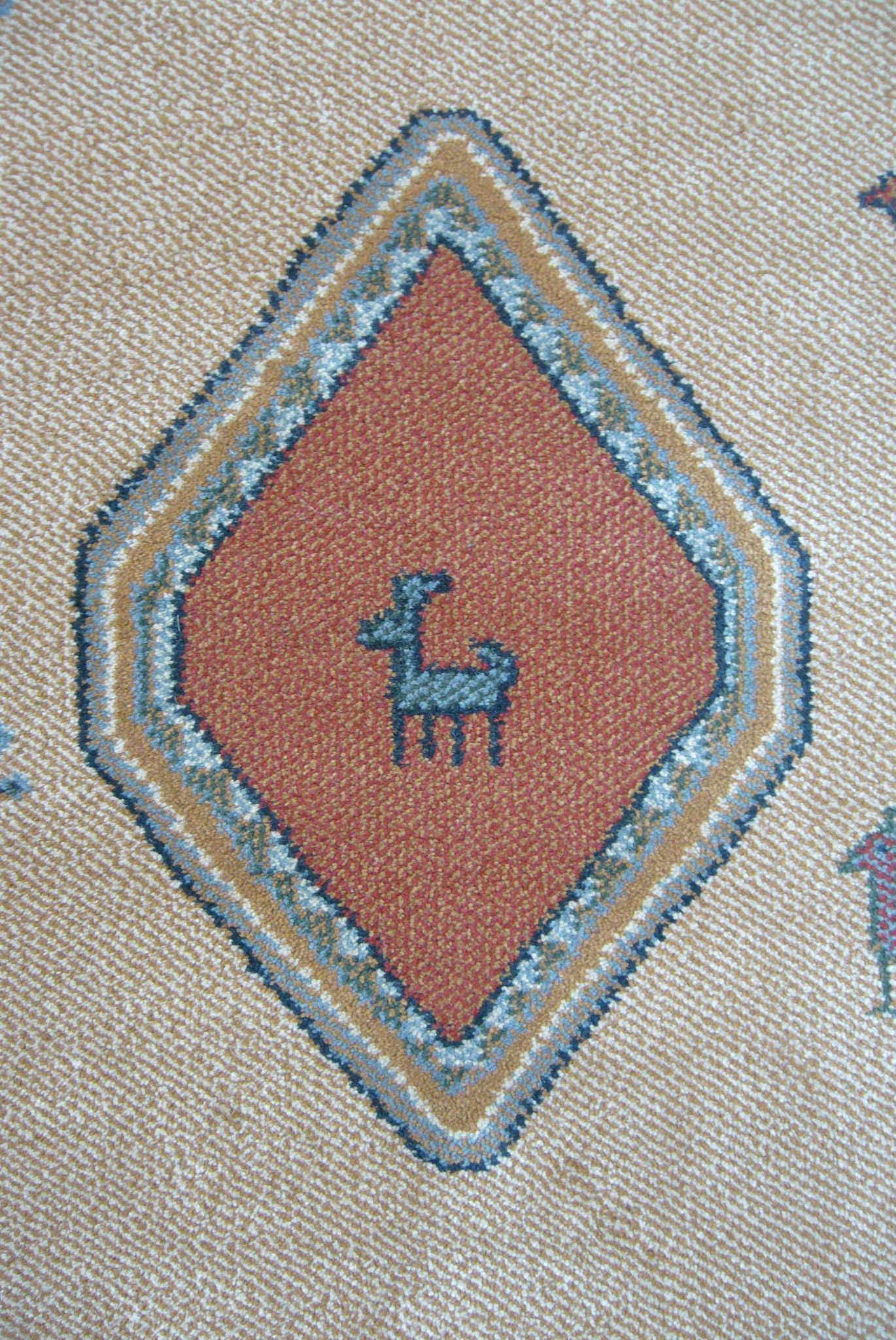 Pair of 60 x 120 Peruvian wool rugs