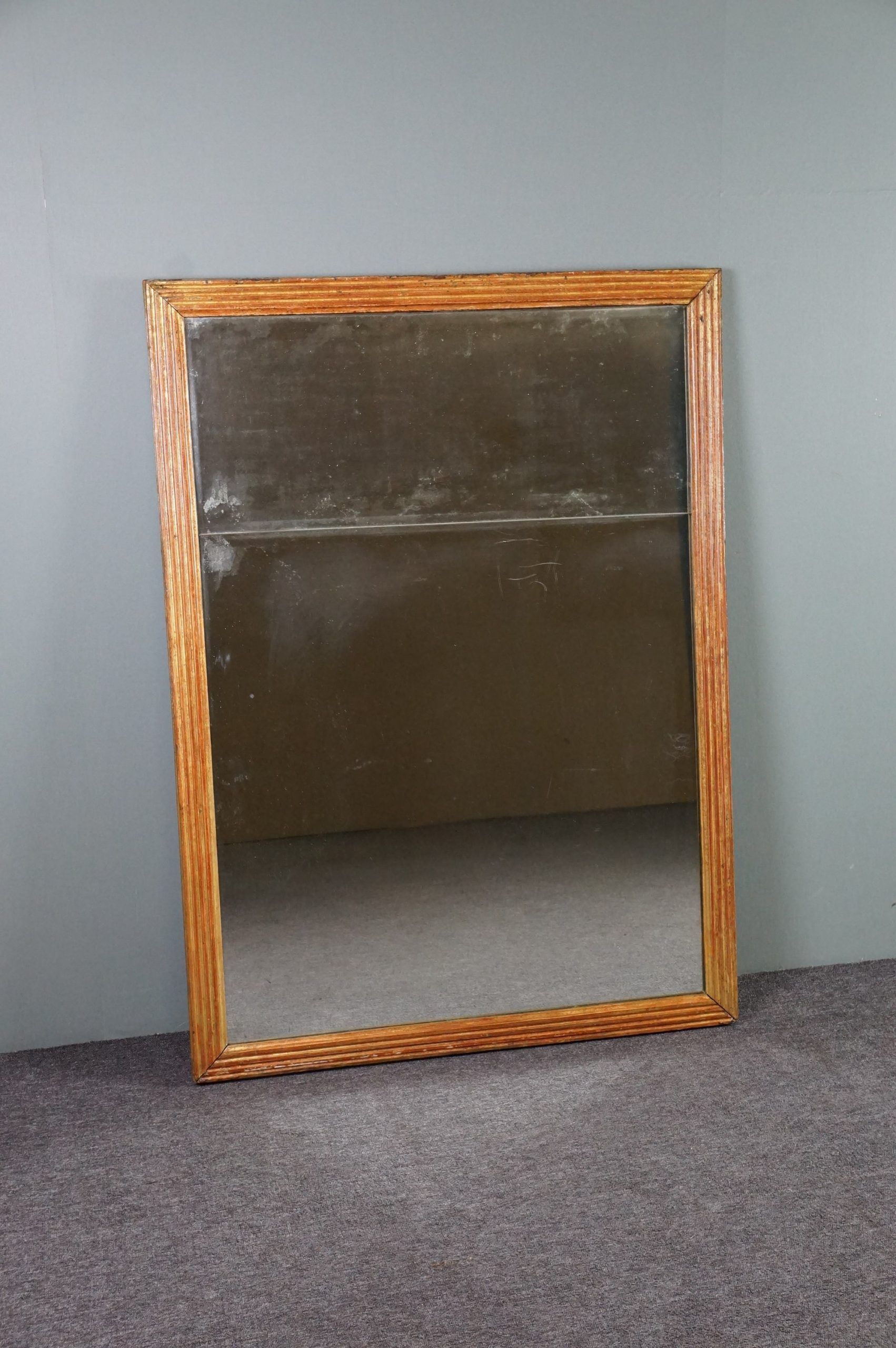Patinated golden fireplace mirror eighteenth century 123 x 91.5 cm
