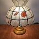 Vintage lamp in wood, brass and mother-of-pearl.