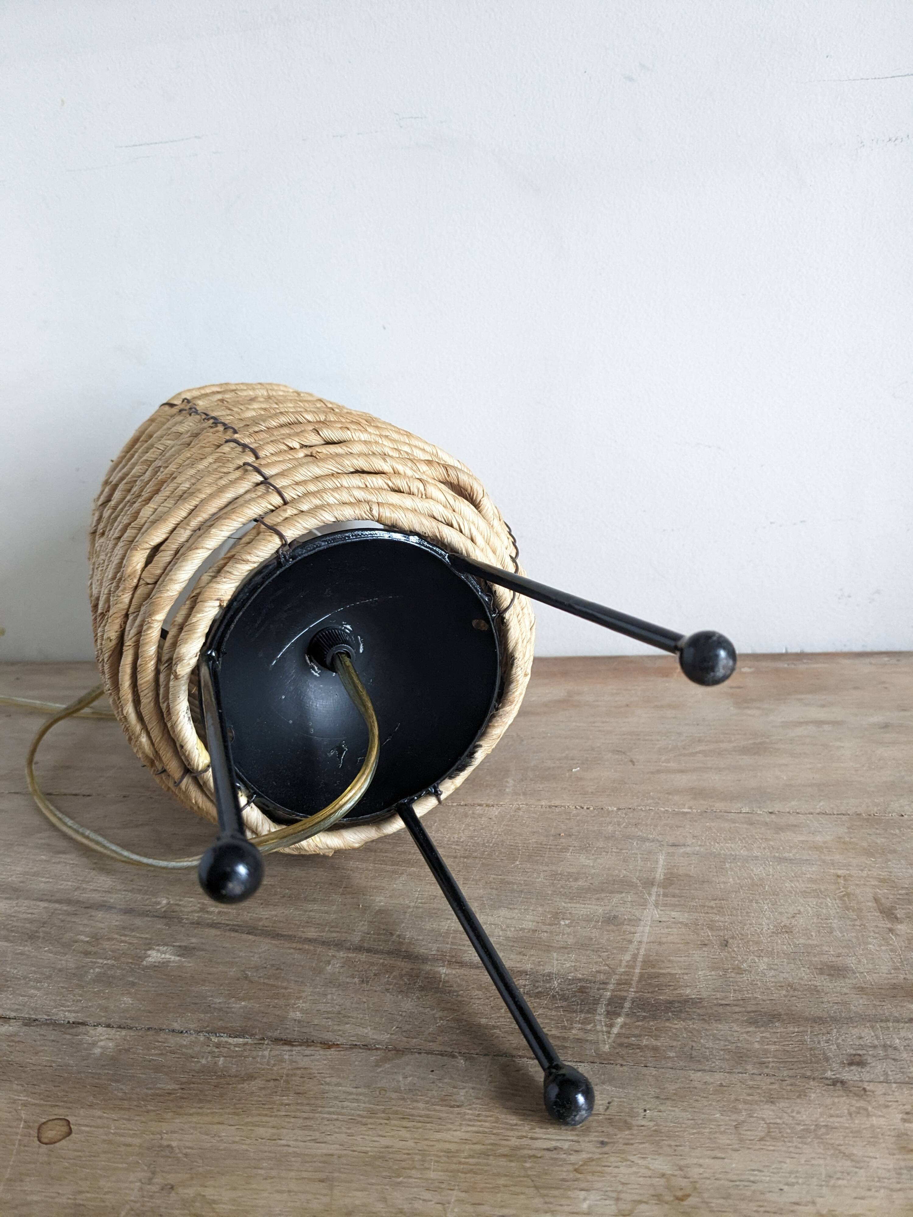 Fiber and metal tripod lamp